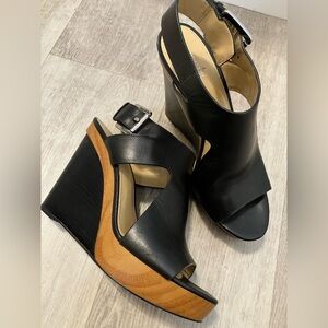 Black Michael Kors wedges in size 8M